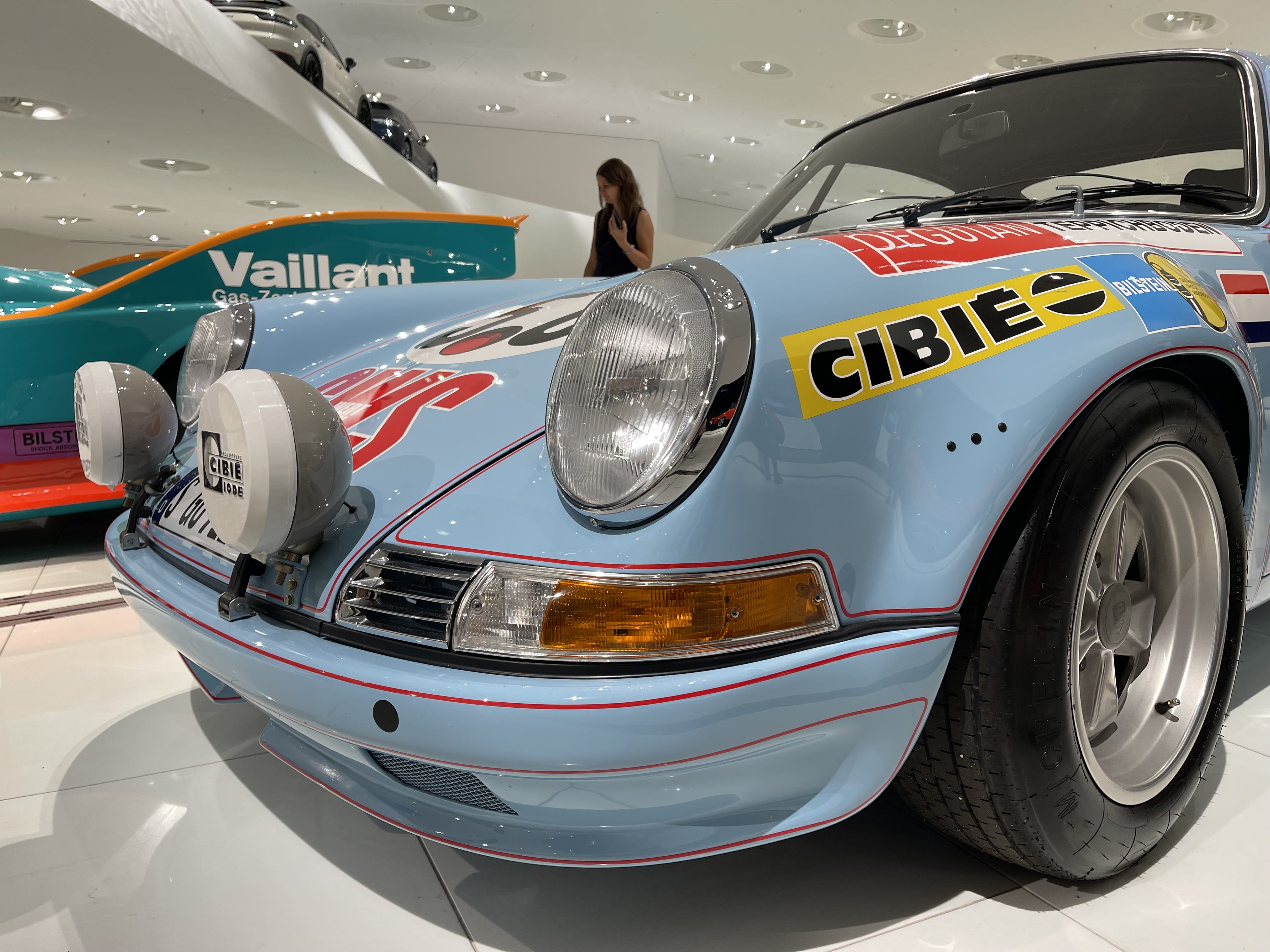 Porsche coupe parked indoors during inspection